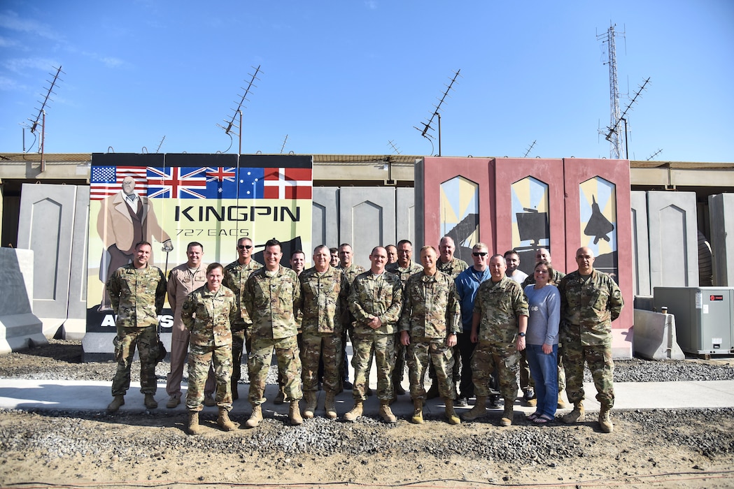 727th Expeditionary Air Control Squadron Airmen, deployed from the Utah Air National Guard, pose for a group photo with UTANG leadership at Al Dhafra Air Base, United Arab Emirates, Mar. 14, 2019. Since September 11, 2001, UTANG members have been activated and deployed for worldwide duty to include Operations Noble Eagle, Enduring Freedom and Iraqi Freedom. (U.S. Air Force photo by Senior Airman Mya M. Crosby)