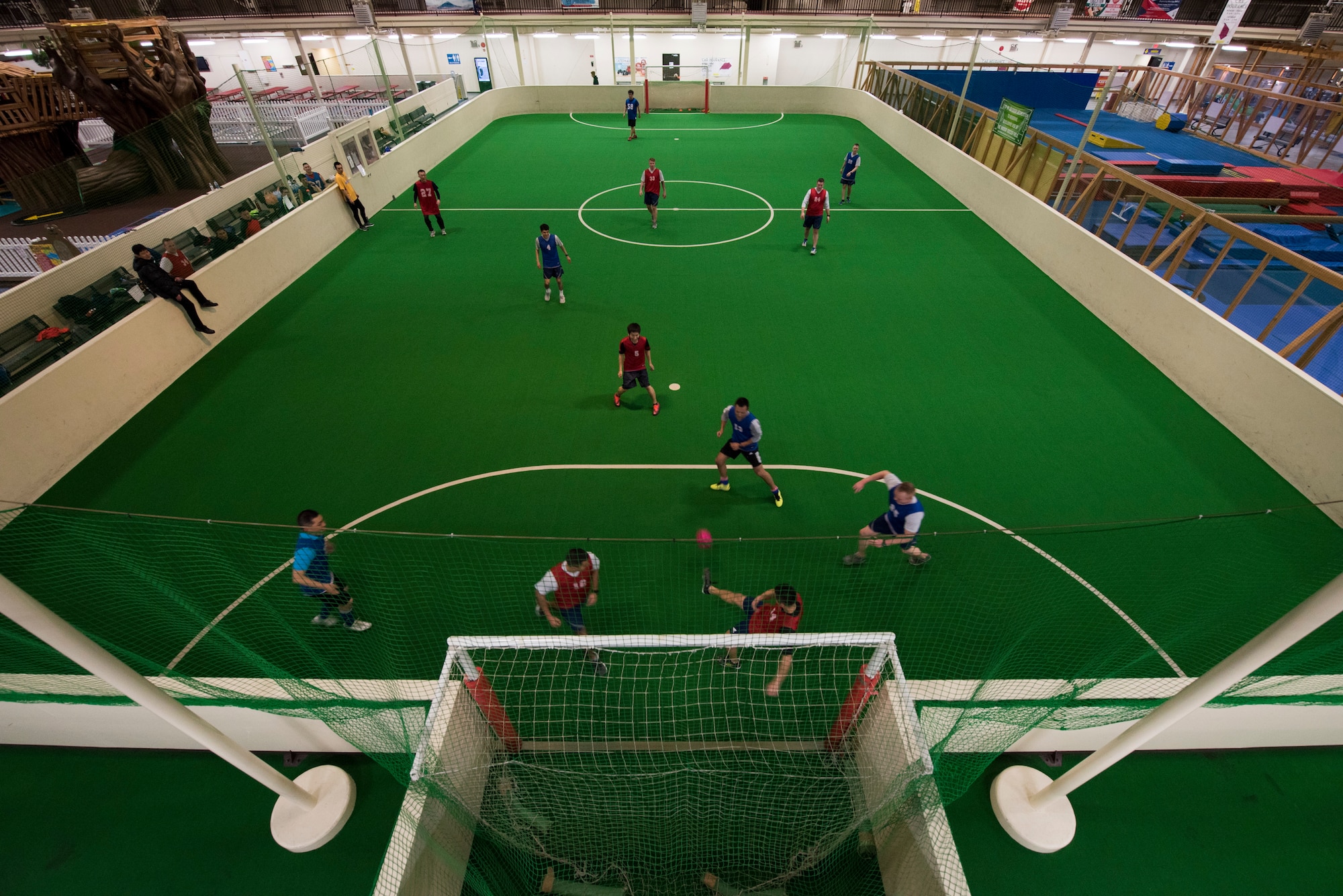 U.S. Air Force and Japan Air Self-Defense Force security forces members play in a bilateral soccer game at Misawa Air Base, Japan, March 15, 2019.  This soccer game helped bolster teamwork and relations between Japanese and American forces, allowing them to communicate in spite of the language barrier(U.S. Air Force photo by Branden Yamada)
