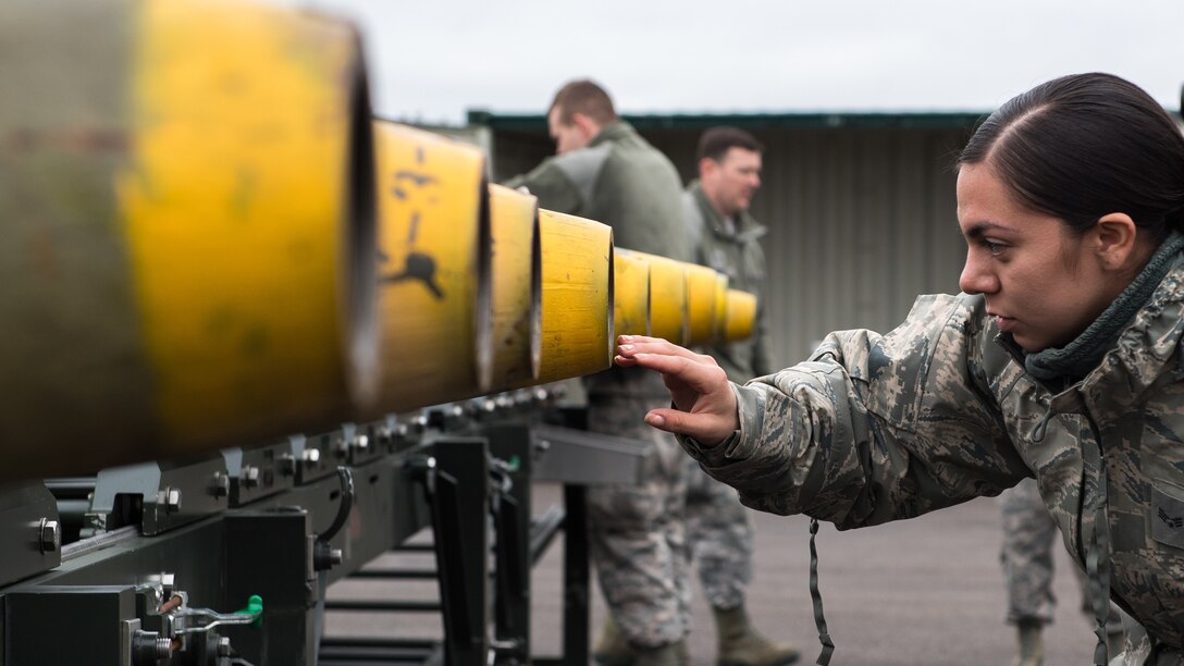 Senior Airman Angelica Melendez, 2nd Munitions Squadron conventional maintenance crew chief deployed from Barksdale Air Force Base, La., inspects the nose of a Guided Bomb Unit - 38 before its assembly at RAF Fairford, England, March 21, 2019.