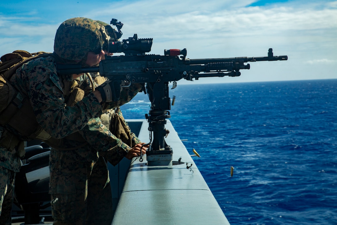 Lance Cpl. Caleb E. Engelhardt, a machine gunner with Bravo Company, Battalion Landing Team, 1st Battalion, 4th Marines fires an M240B medium machine gun while aboard the USS Green Bay, underway in the Pacific Ocean, March 14, 2019. Engelhardt, a native of Joliet, Illinois, graduated Plainfield South High School in May 2017 before enlisting in September later that year. The 31st Marine Expeditionary Unit, the Marine Corps' only continuously forward-deployed MEU, provides a flexible and lethal force ready to perform a wide range of military operations as the premier crisis response force in the Indo-Pacific region.