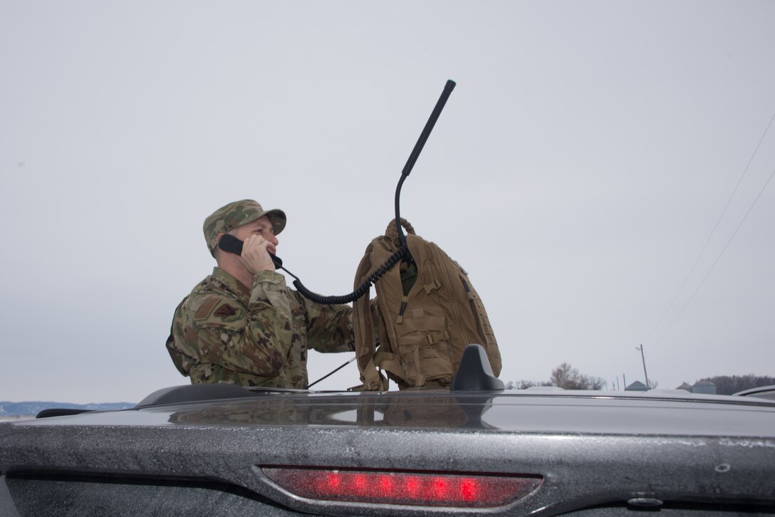 Staff Sgt. Victor Vega, 2nd Combat Weather Systems Squadron weather systems trainer, checks his radio’s signal strength in Council Bluffs, Iowa, Feb. 26, 2019. Vega was part of 2nd Weather Group’s Exercise Adaptive Lightning 19, Task Force Bat Phone, a project that uses off-the-shelf technology combined with rapid development techniques to deliver new communication capabilities to deployed forecasters in contested, degraded or operationally-limited environments. (U.S. Air Force photo by Paul Shirk)