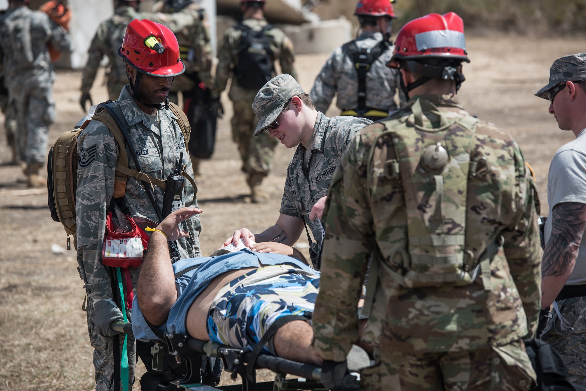 U.S. Airmen and Soldiers from the 3rd Chemical, Biological, Radiological, Nuclear Task Force, Pennsylvania National Guard, evacuate a casualty actor during the exercise Vigilant Guard.