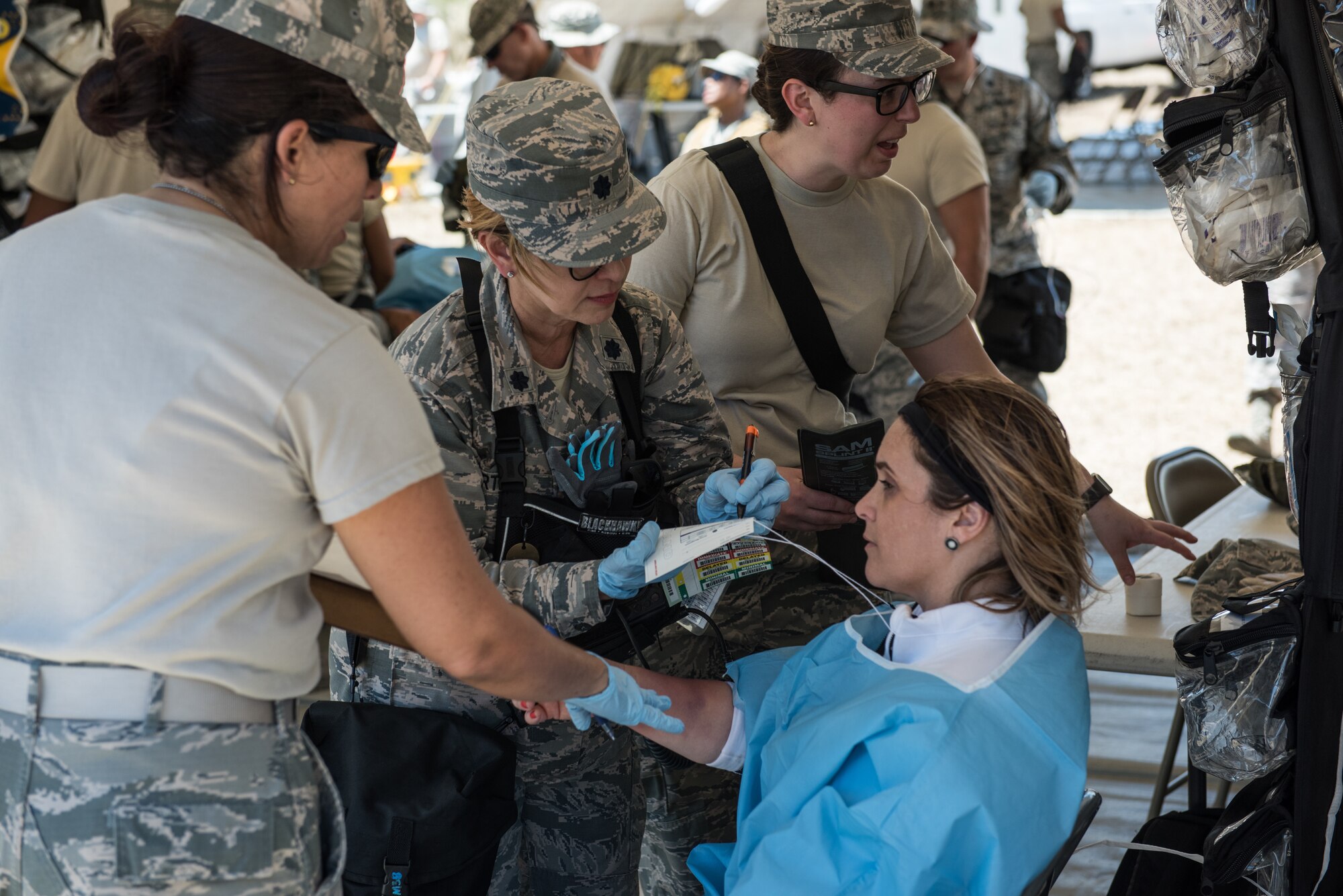 U.S. Airmen with the 156th Medical Group, Puerto Rico Air National Guard and the 193rd Special Operations Medical Group Detachment 1, Pennsylvania ANG, provide treatment for a casualty actor during exercise Vigilant Guard.