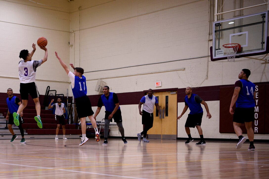 Members from the 4th Fighter Wing compete during the base basketball All-Star game March 22, 2019, at Seymour Johnson Air Force Base, North Carolina.