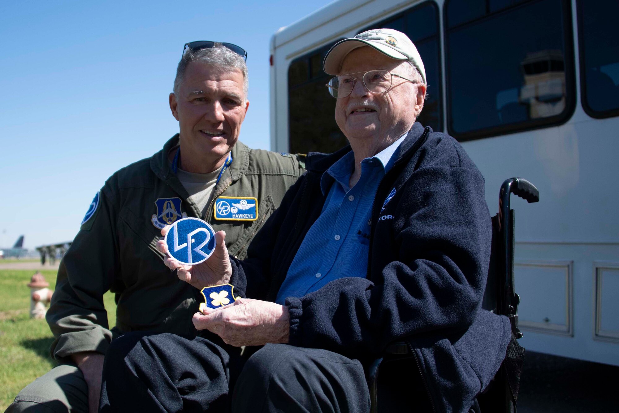 Albert Gill, a former B-24 Liberator navigator, displays patches given to him by Col. Robert VanHoy, 307th Bomb Wing commander March 22, 2019 at Barksdale Air Force Base, Louisiana.  Gill, who served in the 307th Bomb Group during World War II, was on hand to see his grandson, 1st Lt. Jacob Gill, join the bomber community during the graduation of Formal Training Unit Class 18-02. (U.S. Air Force photo by Master Sgt. Ted Daigle)
