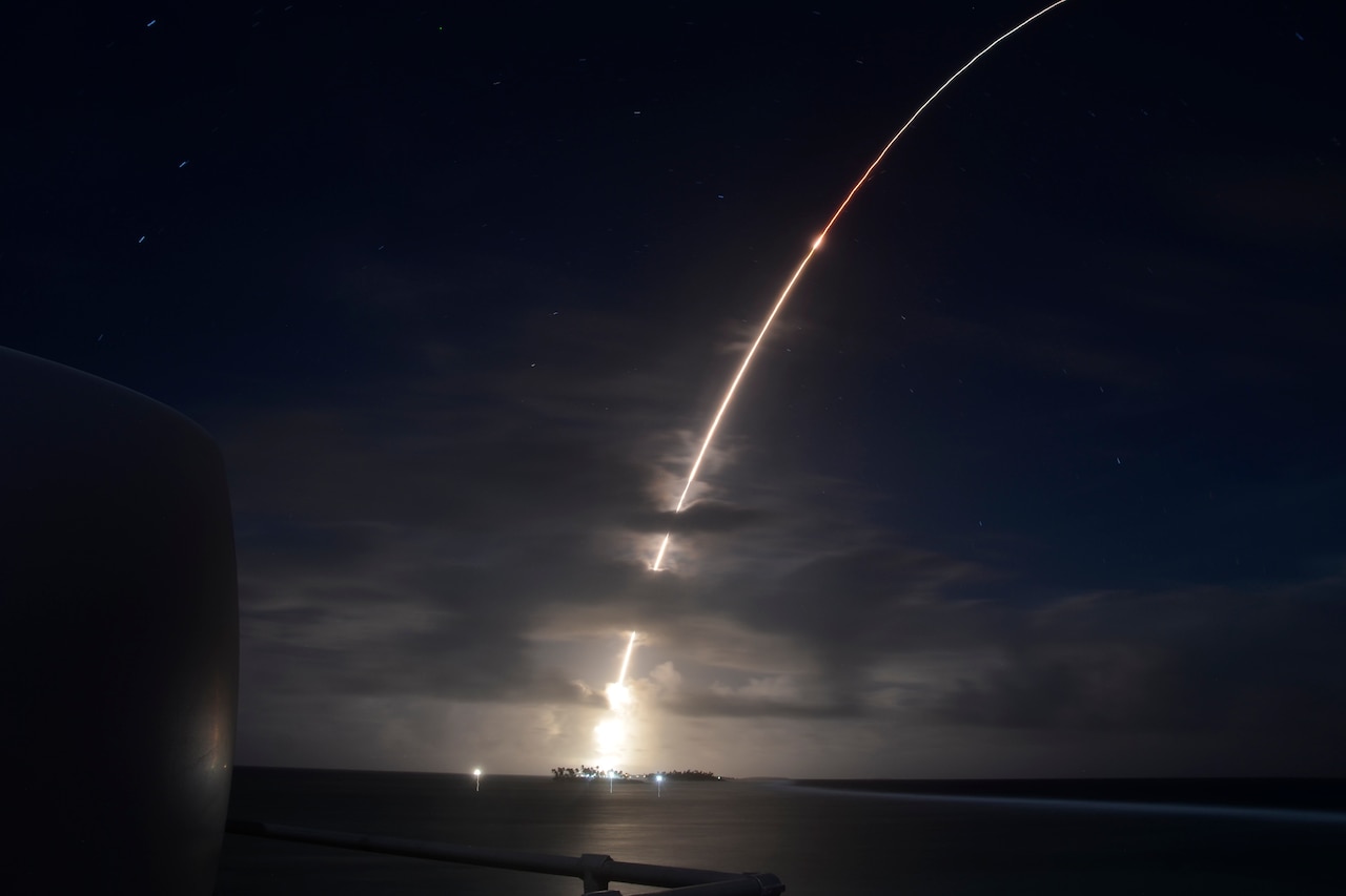 A missile target is launched into a night sky.