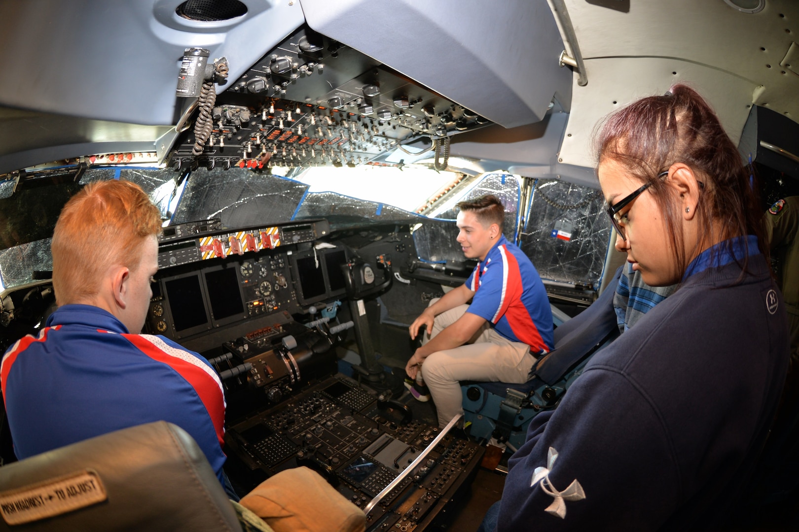 Burleson Independent School District Air Force Junior ROTC students check out the flight deck of a C-5M Super Galaxy March 22 at Joint Base San Antonio-Lackland. Fifty-four students and instructors from Burleson, Texas, attended the basic military training and toured several organization on base during their visit.