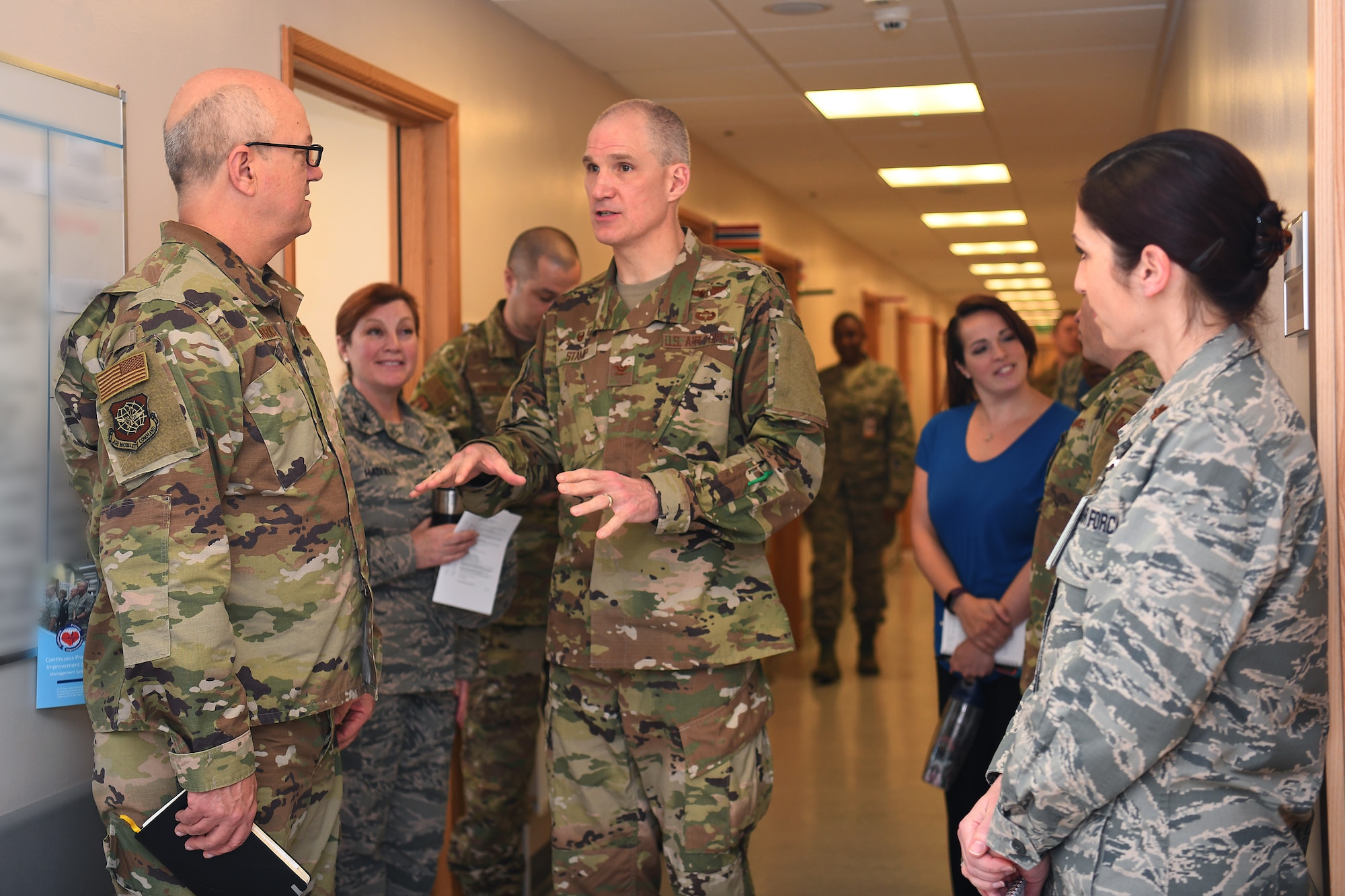 Brig. Gen. Robert J. Marks, Air Mobility Command surgeon and chief of the Air Force Nurse Corps speaks to Col. Thomas Stamp, 48th Medical Group commander, during a visit at Royal Air Force Lakenheath, England, March 22, 2019. Marks visited the Liberty Wing to discuss operational and readiness capabilities of the wing’s medical personnel. (U.S. air Force photo by Airman 1st Class Shanice Williams-Jones)