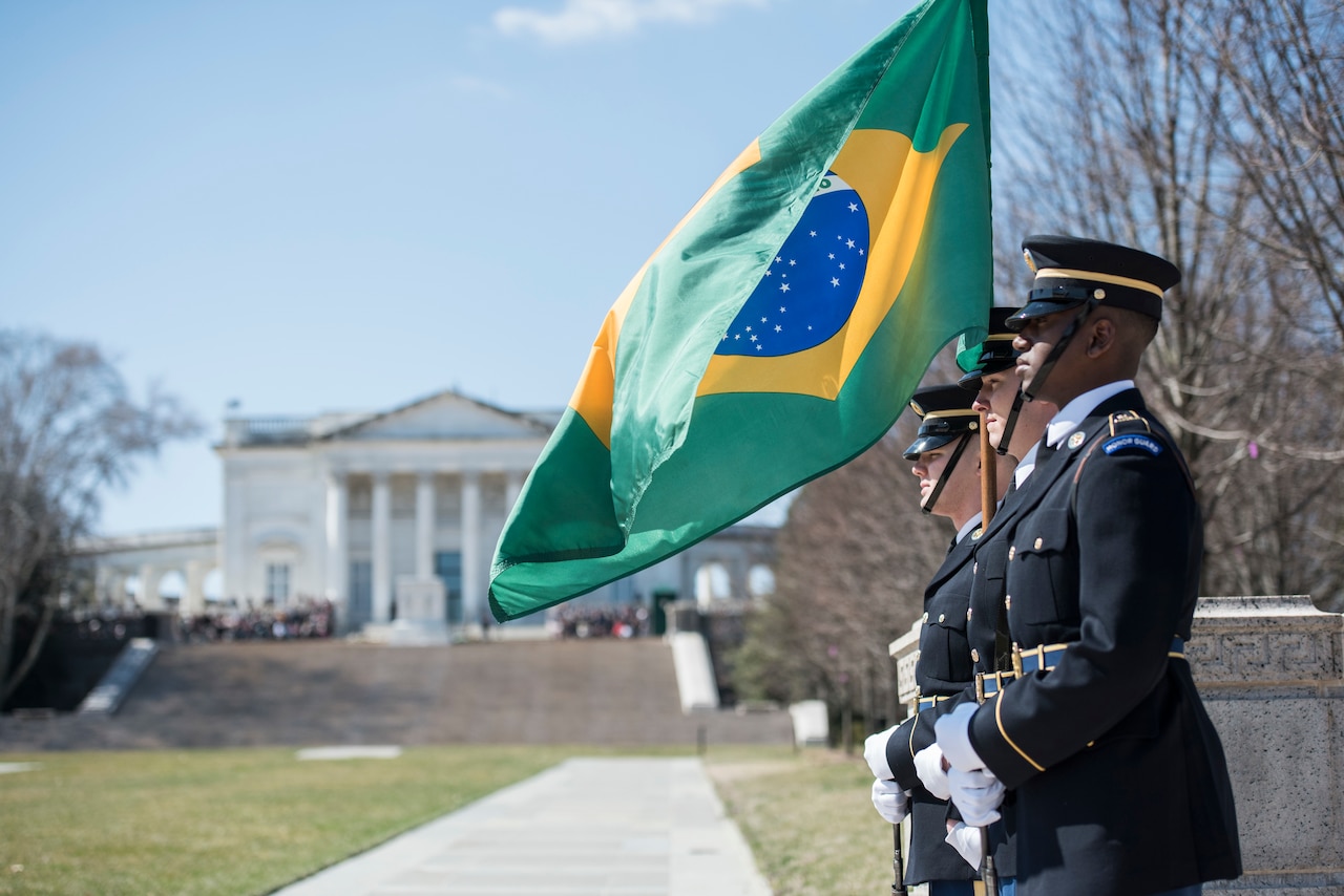 A color guard stands at attention.