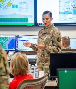 Col. Michaelle Munger, director of operations for the West Virginia National Guard, provides an in-depth briefing in the State Emergency Operations Center (SEOC) at Joint Forces Headquarters (JFHQ) in Charleston, W.Va., to West Virginia Sen. Shelley Moore Capito on Guard activities prior to Hurricane Florence in September 2018.  Munger is the highest ranking female in the West Virginia Army National Guard.