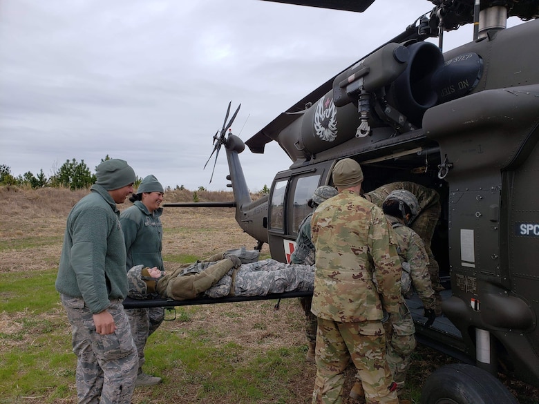 The Aeromedical Evacuation Liason Team led by Capt. Cathy Chavez, Capt. Christian Graves, and TSgt Kristi Gouge from the 43 Aeromedical Evacuation Squadron were key players in an Army mass casualty exercise with the 28th Combat Support Hospital, called Operation Falcon Frenzy. (Photos by Major Catherine Ortega)