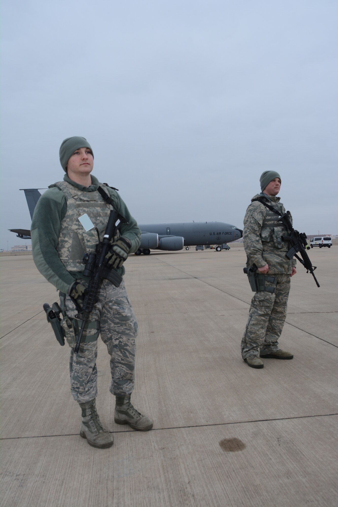 Staff Sgt. Jeffrey Wright and Senior Airman Andrew Coughlin, 507th Security Forces Squadron, stand guard during an exercise geared toward wartime preparation and readiness March 2, 2019, at Tinker Air Force Base, Oklahoma. The 507th Air Refueling Wing's unit effectiveness inspection capstone event is scheduled for Nov. 15-19, 2019. (U.S. Air Force photo by Tech. Sgt. Lauren Gleason) (This photo has been altered for security purposes by blurring out identification badges.)