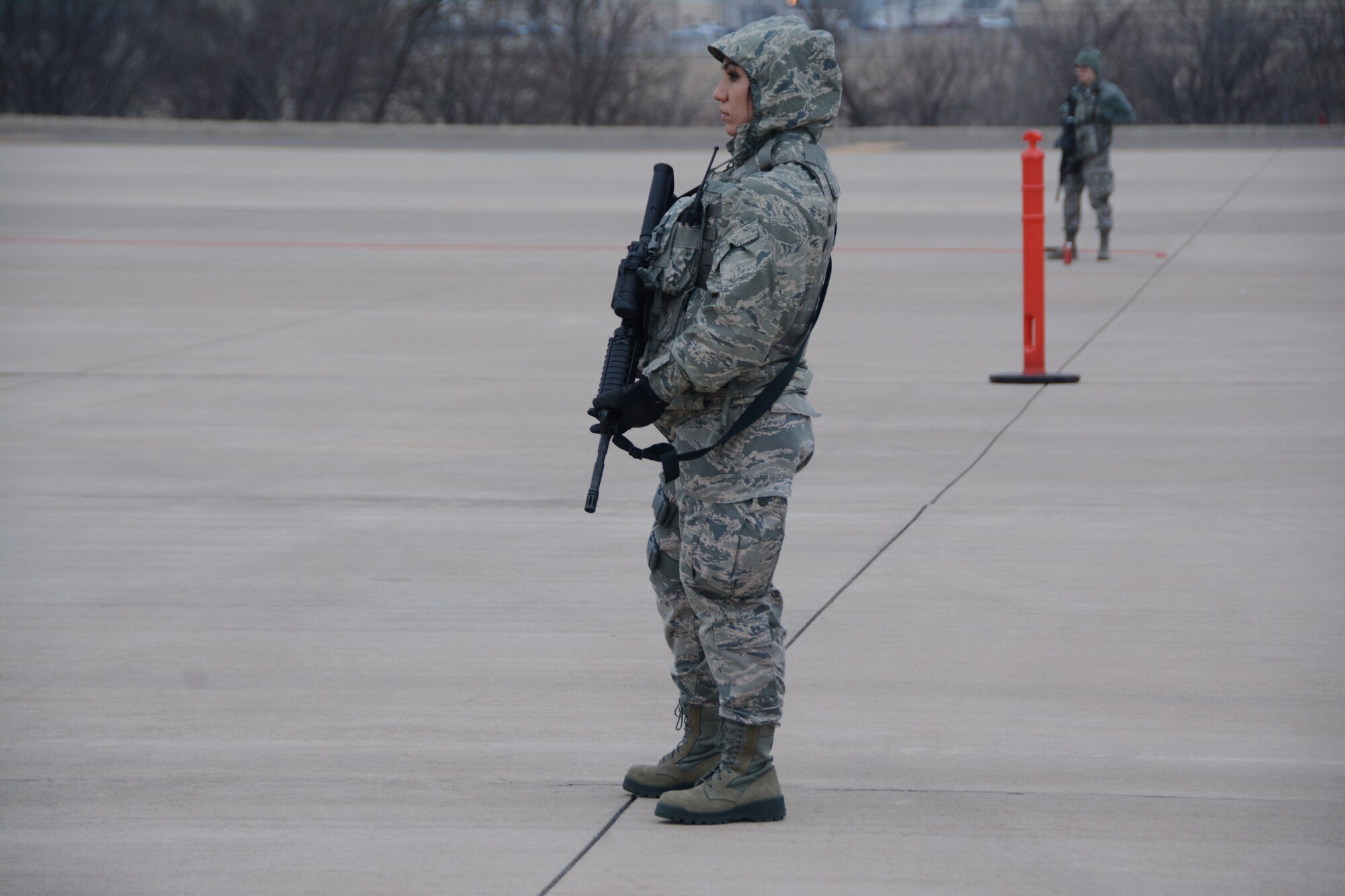 Senior Airman Yesenia Anguiano, 507th Security Forces Squadron, guards the perimeter of a secure area during an exercise geared toward wartime preparation and readiness on the 507th Air Refueling Wing flightline March 2, 2019, at Tinker Air Force Base, Oklahoma. The 507th Air Refueling Wing's unit effectiveness inspection capstone event is scheduled for Nov. 15-19, 2019. (U.S. Air Force photo by Tech. Sgt. Lauren Gleason)