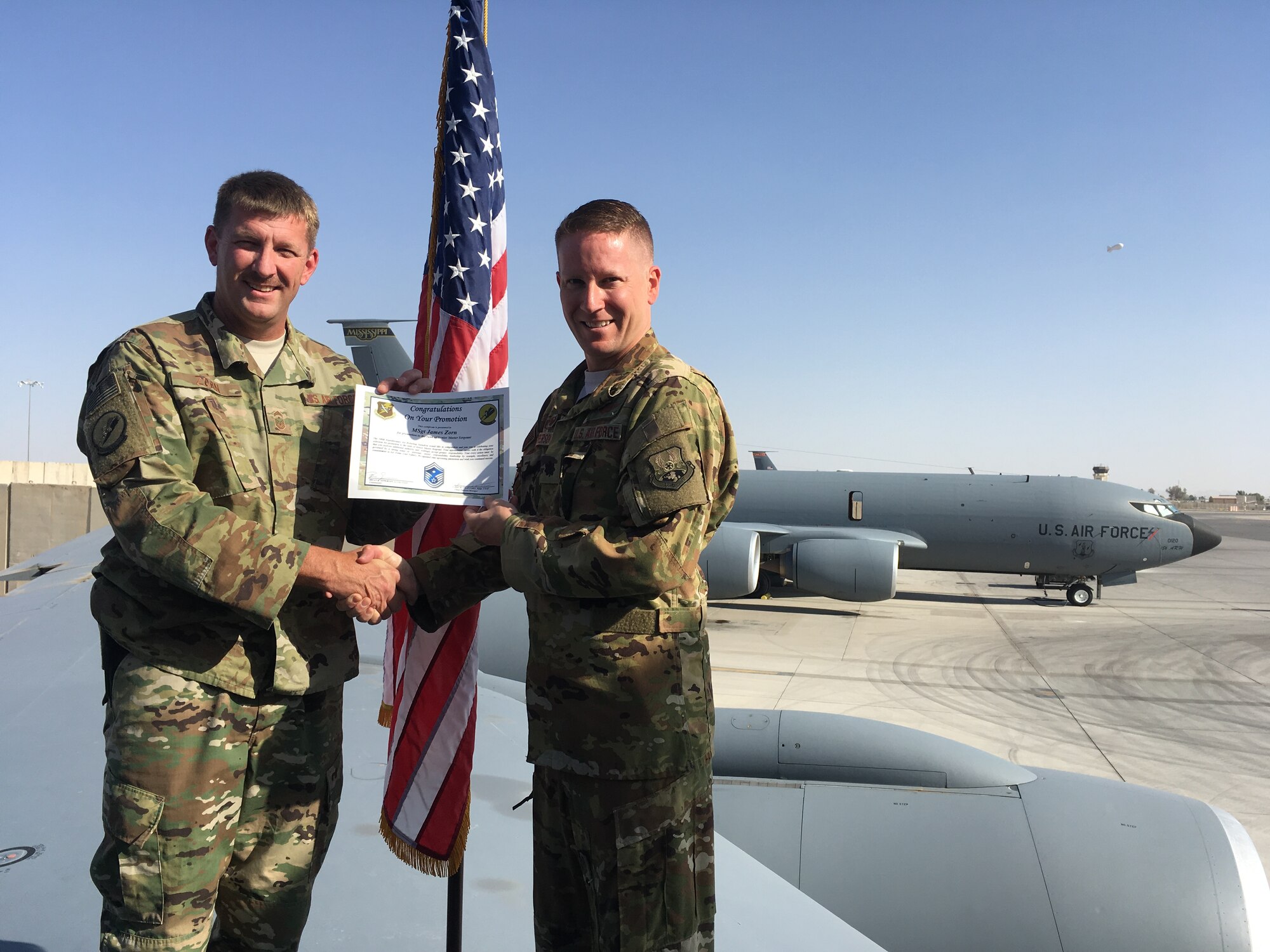 Senior Master Sgt. James Zorn, 187th Fighter Wing first sergeant, receives a Certificate of Promotion to his current rank September 25, 2018, while deployed with the 340th Expeditionary Air Refueling Squadron in southwest Asia. (Courtesy photo by Senior Master Sgt. James Zorn)