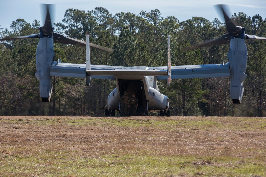 Marines board an MV-22 Osprey during Tactical Recovery of Aircraft and Personnel training at Camp Lejeune, North Carolina, Feb. 1, 2019. TRAP training enhances combat readiness and crisis response skills by preparing Marines to confidently enter potentially combative areas, tactically extract personnel, recover aircraft and retrieve or destroy sensitive material. The Marines are with the 24th Marine Expeditionary Unit. (U.S. Marine Corps photo by Lance Cpl. Larisa Chavez)