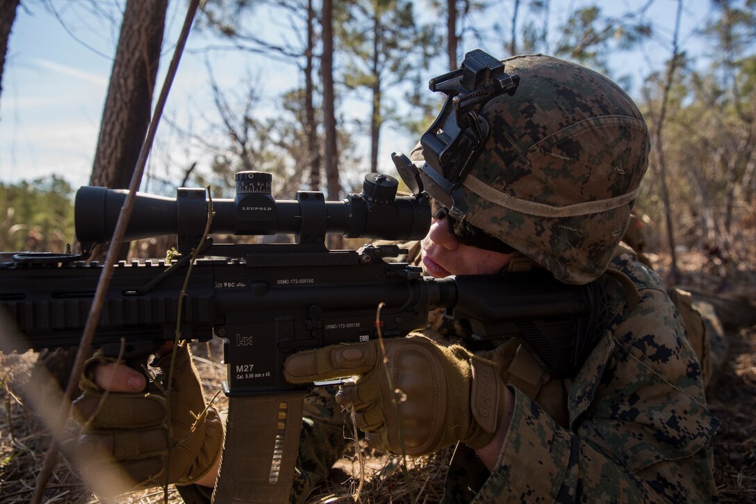 Lance Cpl. Jacob Deryke  provides security during Tactical Recovery of Aircraft and Personnel training at Camp Lejeune, North Carolina, Feb. 1, 2019. TRAP training enhances combat readiness and crisis response skills by preparing Marines to confidently enter potentially combative areas, tactically extract personnel, recover aircraft, and retrieve or destroy sensitive material. Deryke is an Infantry Marine with 1st Battalion, 8th Marines, 24th Marine Expeditionary Unit. (U.S. Marine Corps photo by Lance Cpl. Larisa Chavez)