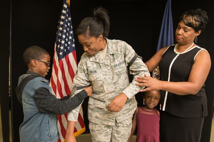 Senior Airman Noel Cullen is promoted to staff sergeant on Oct. 13, 2018, at Joint Base Langley-Eustis, Virginia. Her new rank was "sewed" on by her son and mother. Cullen was honored in January, 2019, for saving a life.