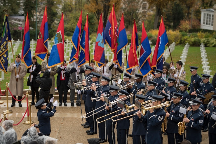 Image of a ceremonial band performing at a Veteran's cemetery in Europe