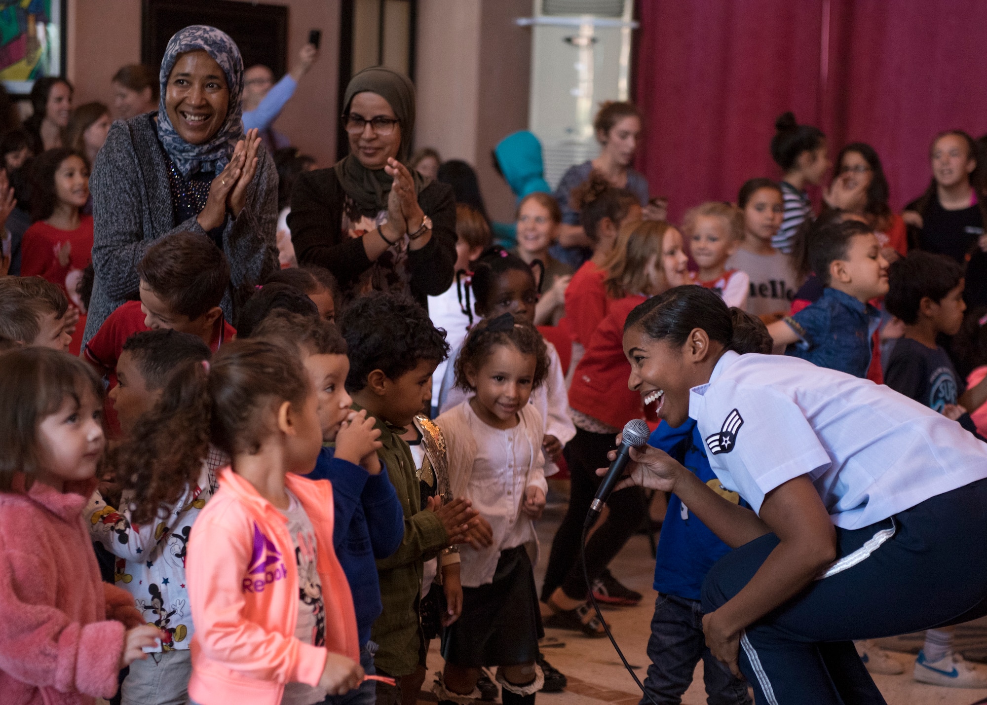Air Force singer performing for children in Morocco