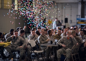 U.S. Air Force Airmen celebrate during the Maintenance Professional of the Year awards banquet at Joint Base Langley-Eustis, Virginia, March 22, 2019.