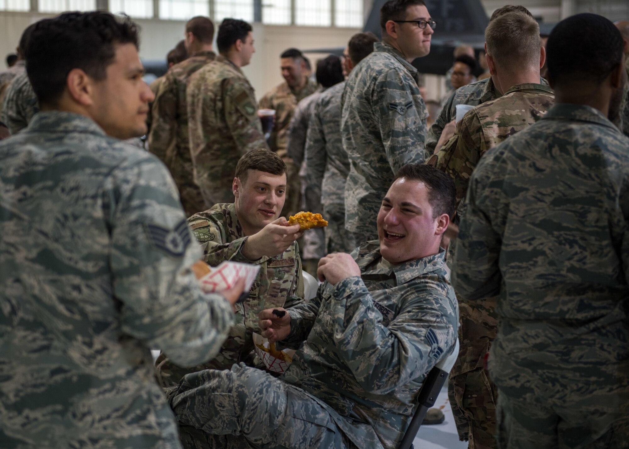 U.S. Air Force Airmen celebrate during the Maintenance Professional of the Year awards banquet at Joint Base Langley-Eustis, Virginia, March 22, 2019.