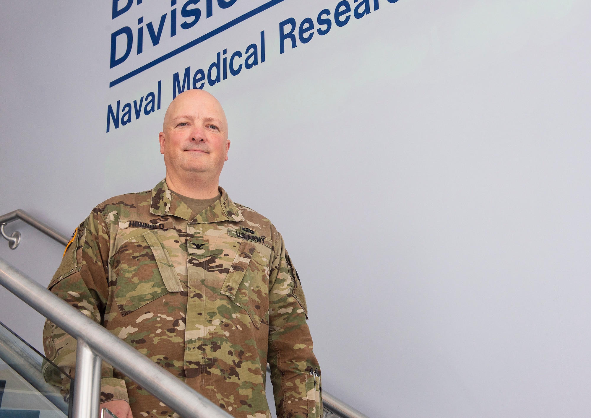 U.S. Army Col. Cary Honnold, Navy Medical Research Unit-Dayton comparative pathologist, poses at his unit on Wright-Patterson Air Force Base, Ohio, Jan. 17, 2019. (U.S. Air Force photo by R.J. Oriez)