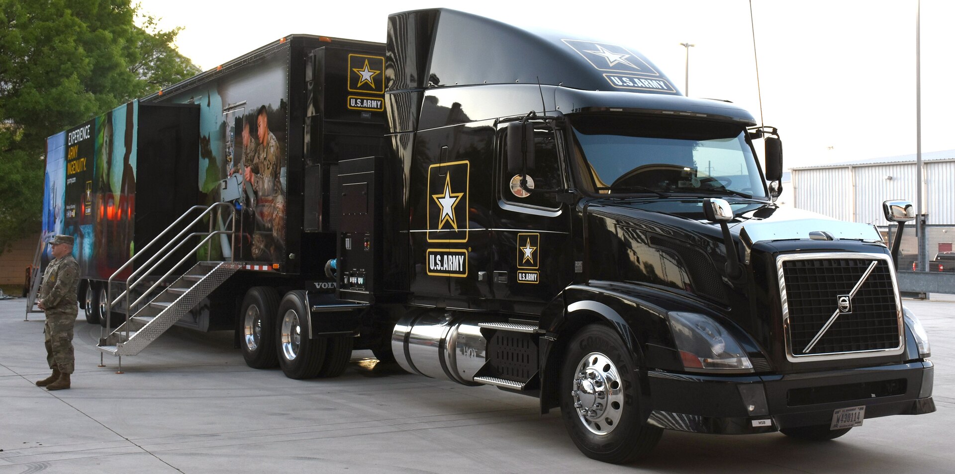 Sgt. 1st Class Richard Sullins, STEM mobile exhibit operator with Mission Support Battalion, awaits for another group of individuals to enter the STEM mobile exhibit at the Spurs Military Appreciation Night hosted March 20 at the AT&T Center.