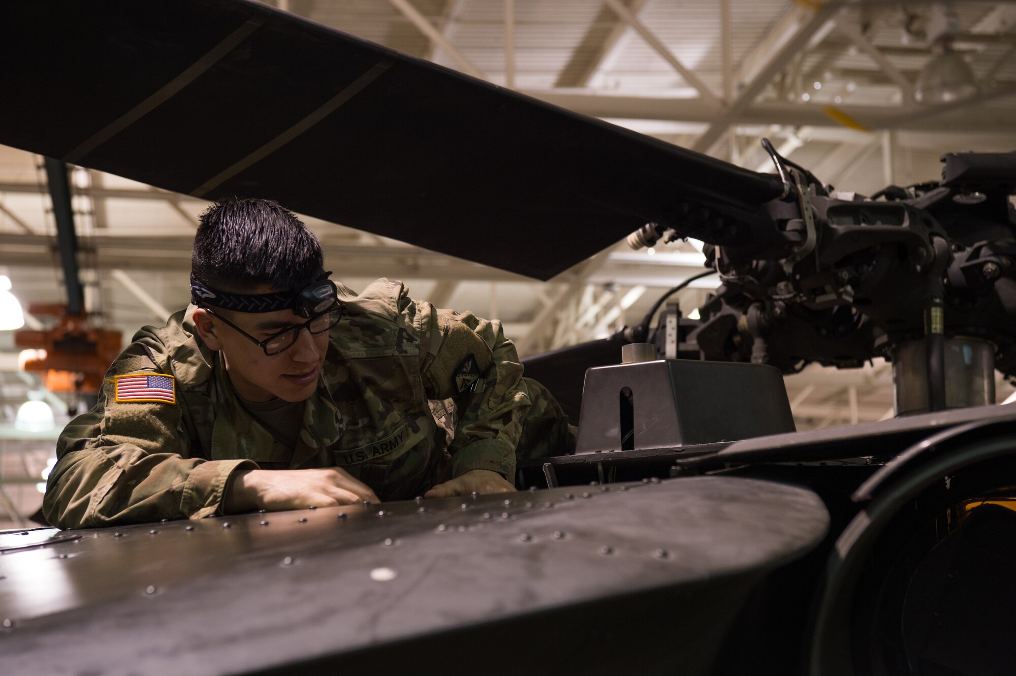 U.S. Army Pvt. Pfc. Victor Gracia, Alpha Company, 1st Battalion, 210th Aviation Regiment, 128th Avn. Brigade student, trains on the Blackhawk Electrical Trainer at Joint Base Langley-Eustis, Virginia, March 26, 2019.