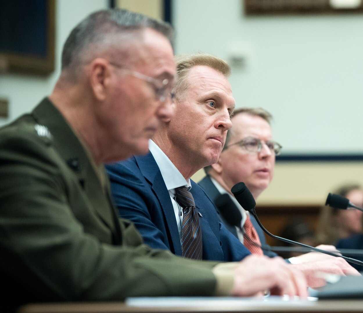 Acting Defense Secretary Patrick M. Shanahan (center), and Marine Corps Gen. Joe Dunford (left), chairman of the Joint Chiefs of Staff, left, testify to the House Armed Services Committee on the fiscal year 2020 national defense budget request March 26.
