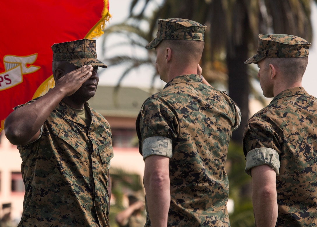 Sgt. Maj. Alfred R. Broadus, former Sergeant Major of Headquarters and Headquarters Squadron (H&HS), salutes Lt. Col. Alan J. Clarke, commanding officer of H&HS during a relief and appointment ceremony on Marine Corps Air Station Miramar, Calif., Mar. 22. The ceremony formally recognized Broadus for his honorable service and welcomed Sgt. Maj. John K. Lewis as the new squadron sergeant major. (U.S. Marine Corps photo by Cpl. Becky Cleveland)