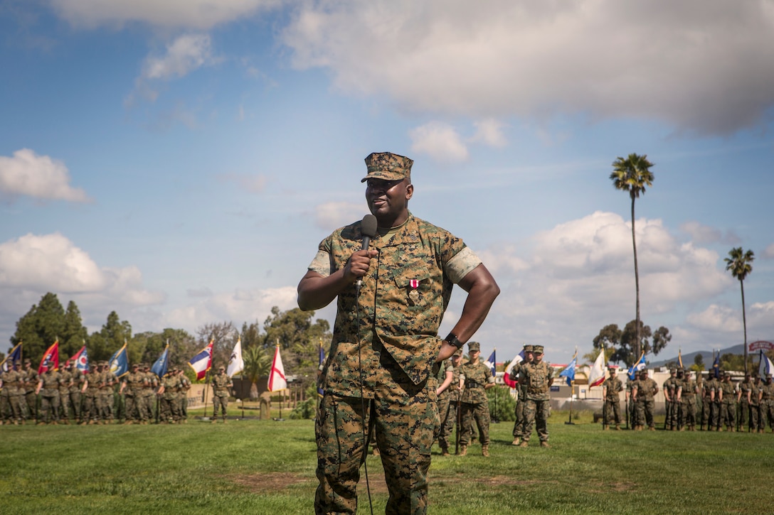 Sgt. Maj. Alfred R. Broadus, former Sergeant Major of Headquarters and Headquarters Squadron (H&HS), speaks to family, friends and Marines during a relief and appointment ceremony on Marine Corps Air Station Miramar, Calif., Mar. 22. The ceremony formally recognized Broadus for his honorable service and welcomed Sgt. Maj. John K. Lewis as the new squadron sergeant major. (U.S. Marine Corps photo by Cpl. Becky Cleveland)