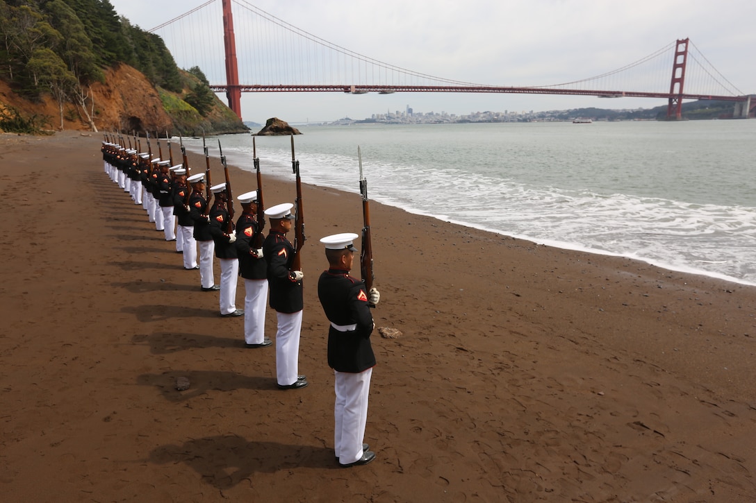 Marines with the Silent Drill Platoon, Marine Barracks Washington D.C., execute their "long line" sequence at the Golden Gate Bridge, San Francisco, California, Mar. 19, 2019. The platoon posed for photos to recreate images that were taken by previous platoon's at the bridge.