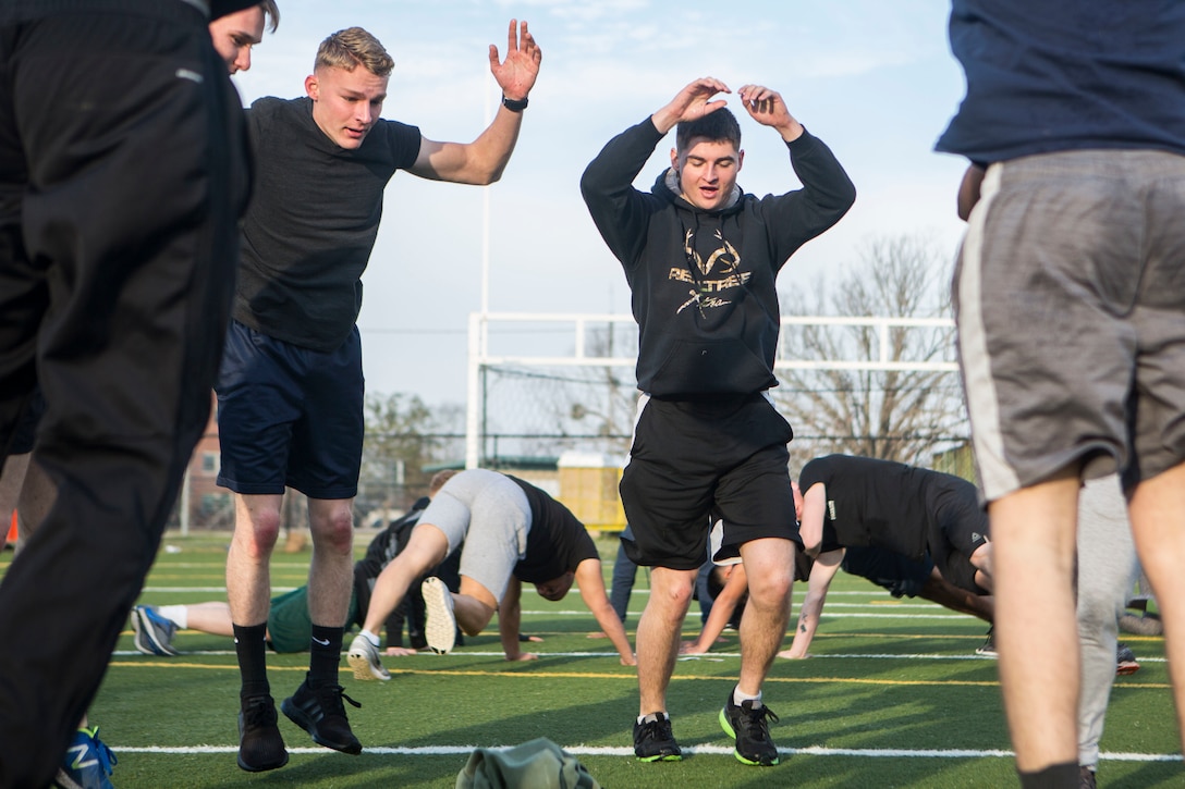 U.S. Marines and Sailors with 24th Marine Expeditionary Unit execute physical training at Camp Lejeune, N.C., Feb. 28, 2019. PT was held to promote unit cohesion and increase physical readiness. (U.S. Marine Corps photo by Lance Cpl. Camila Melendez)