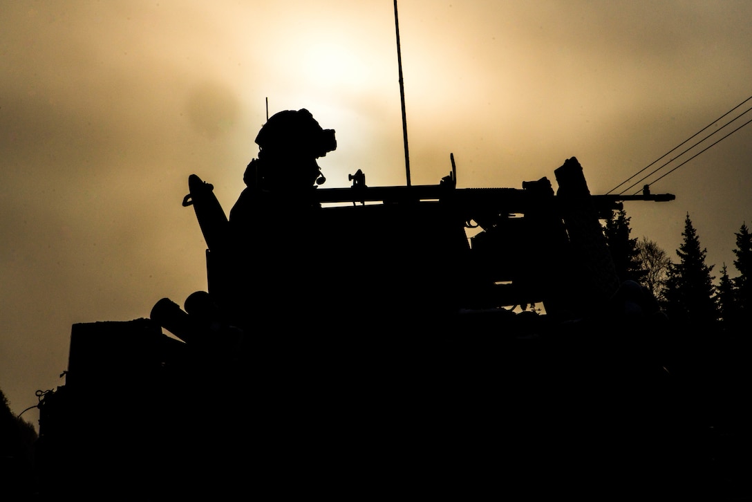 A U.S. Marine with Marine Rotational Force-Europe 19.1, Marine Forces Europe and Africa, stands security in a Bandvagn 206 all-terrain carrier’s .50-caliber mounted weapon during Exercise Northern Wind 19 in northern Sweden, March 21, 2019. The exercise increases interoperability between the U.S. Marines with NATO allies and partners; reinforcing mutually-beneficial defense relationships between participating countries.