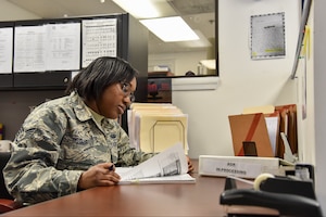 Staff Sgt. Lorena Royale, personnel specialist, Maryland Air National Guard, Joint Force Headquarters, collects mail for the personnel office, February 12, 2019, at the Fifth Regiment Armory, Baltimore, Maryland. Royale has been a member of the MDANG since 2014.