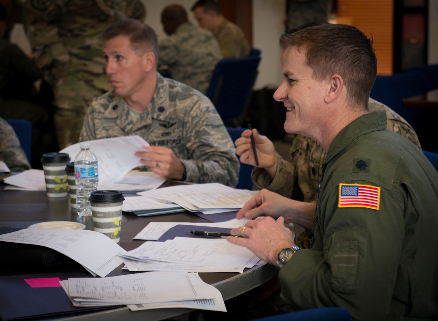 Lt. Col. Nicholas Rowe, 423rd Mobility Squadron commander, participates in an exercise scoring records of enlisted Airmen at Joint Base San Antonio-Randolph March 19. During the exercise squadron commanders discussed various promotion consideration characteristics before awarding an overall promotion recommendation to enlisted Airmen’s records.