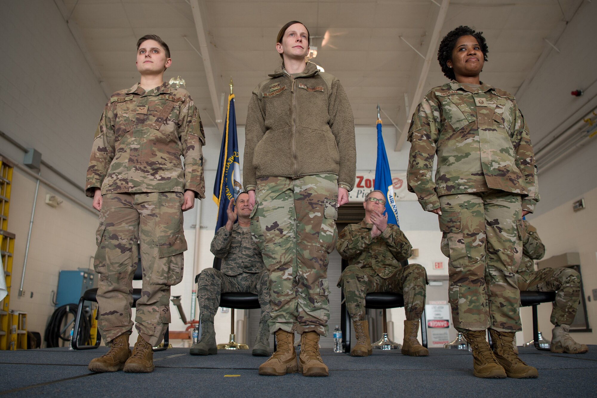 The Kentucky Air National Guard’s Outstanding Airmen for 2018 — Senior Airman Brianna Cook (left), Staff Sgt. Danielle Blankenship (center) and Master Sgt. Brittany Ingram (right) — take the stage during a ceremony at the Kentucky Air National Guard Base in Louisville, Ky., March 10, 2019. The ceremony, which highlighted the unit’s accomplishments during the past year, concluded with the presentation of the wing’s 18th Air Force Outstanding Unit Award. (U.S. Air National Guard photo by Staff Sgt. Joshua Horton)