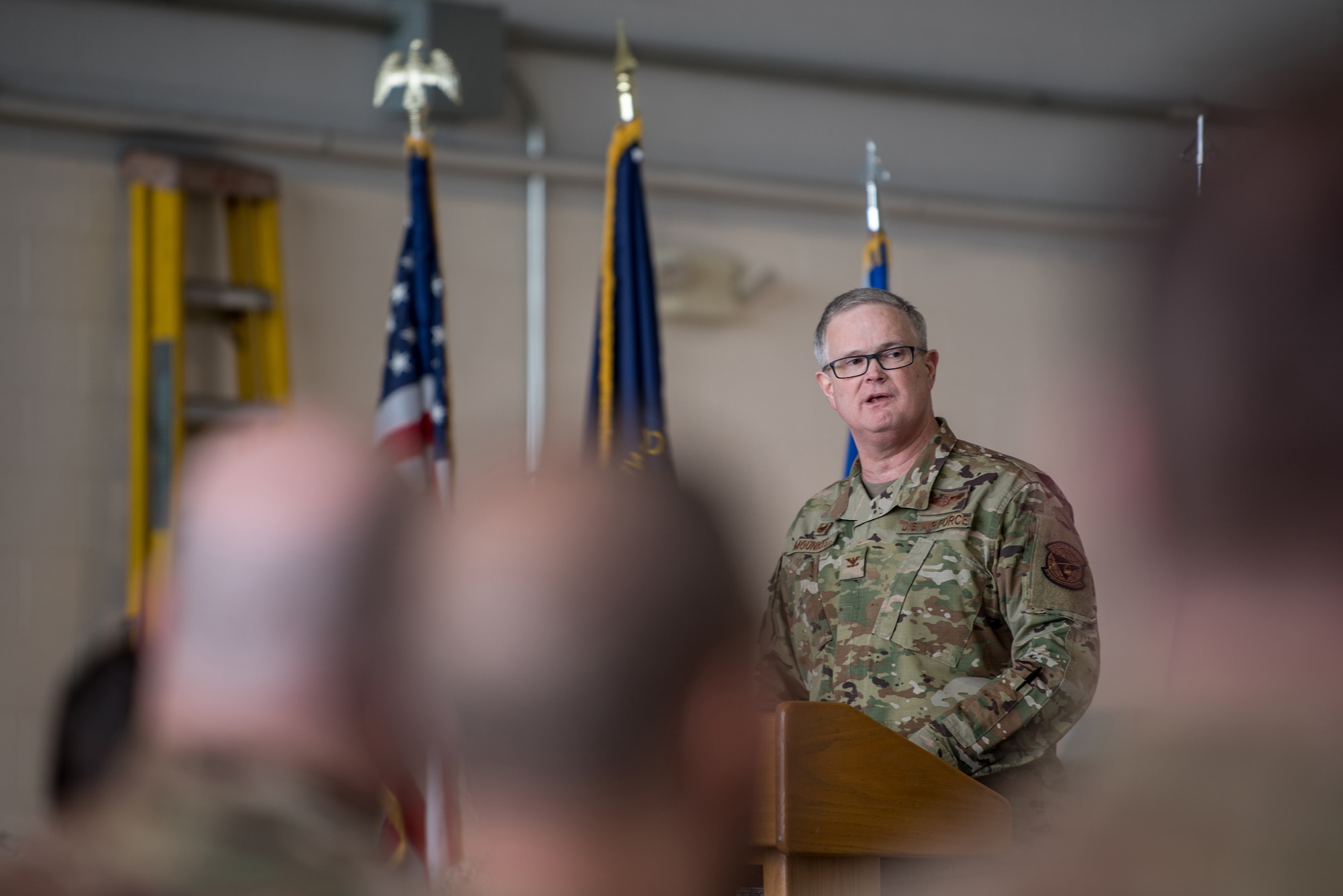 Col. David Mounkes, commander of the 123rd Airlift Wing, speaks to unit members during a ceremony at the Kentucky Air National Guard Base in Louisville, Ky., March 10, 2019. The ceremony, which highlighted the unit’s accomplishments during the past year, concluded with the presentation of the wing’s 18th Air Force Outstanding Unit Award. (U.S. Air National Guard photo by Staff Sgt. Joshua Horton)