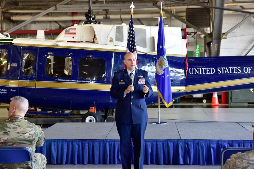 Col. Andrew Purath, 11th Wing and Joint Base Andrews commander, speaks to attendees at the Honorary Commander’s Ceremony in Hangar One on JB Andrews, Md., March 19, 2019. The JBA Honorary Commanders Program gives the local community an opportunity to build a relationship with the base and its people.  (U.S. Air Force photo taken by Airman 1st Class Noah Sudolcan)