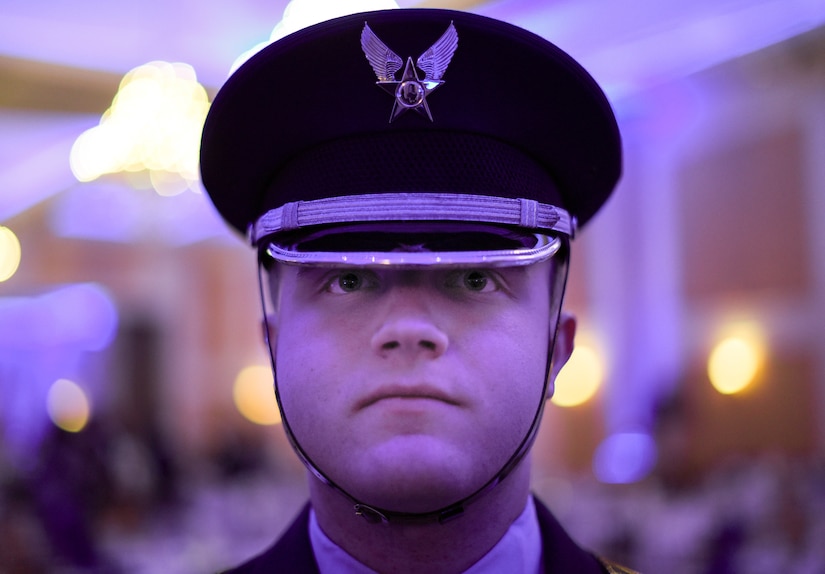 A Joint Base McGuire-Dix-Lakehurst Honor Guard Airman poses during the 87th Air Base Wing Dining Out celebration at The Merion event center in Cinnaminson, N.J., March 22, 2019. Airmen with the 87th ABW celebrate the Wing’s ten-year anniversary alongside Joint Base MDL of becoming the only tri-service installation since they stood up in 2009. (U.S. Air Force photo by Airman 1st Class Ariel Owings)
