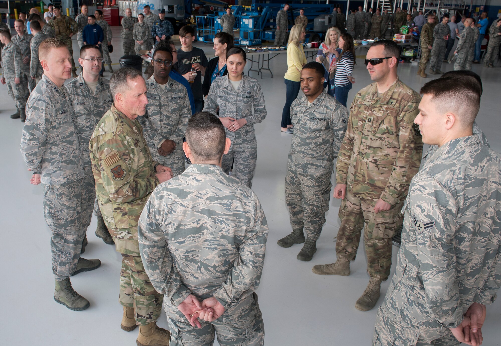 Air Force Chief of Staff Gen. David L. Goldfein talks with Airmen during his visit to Offutt Air Force Base, Nebraska, March 27, 2019. Goldfein was joined by Chief Master Sgt. of the Air Force Kaleth O. Wright to survey damage caused by recent flooding. (U.S. Air Force photo by Delanie Stafford)