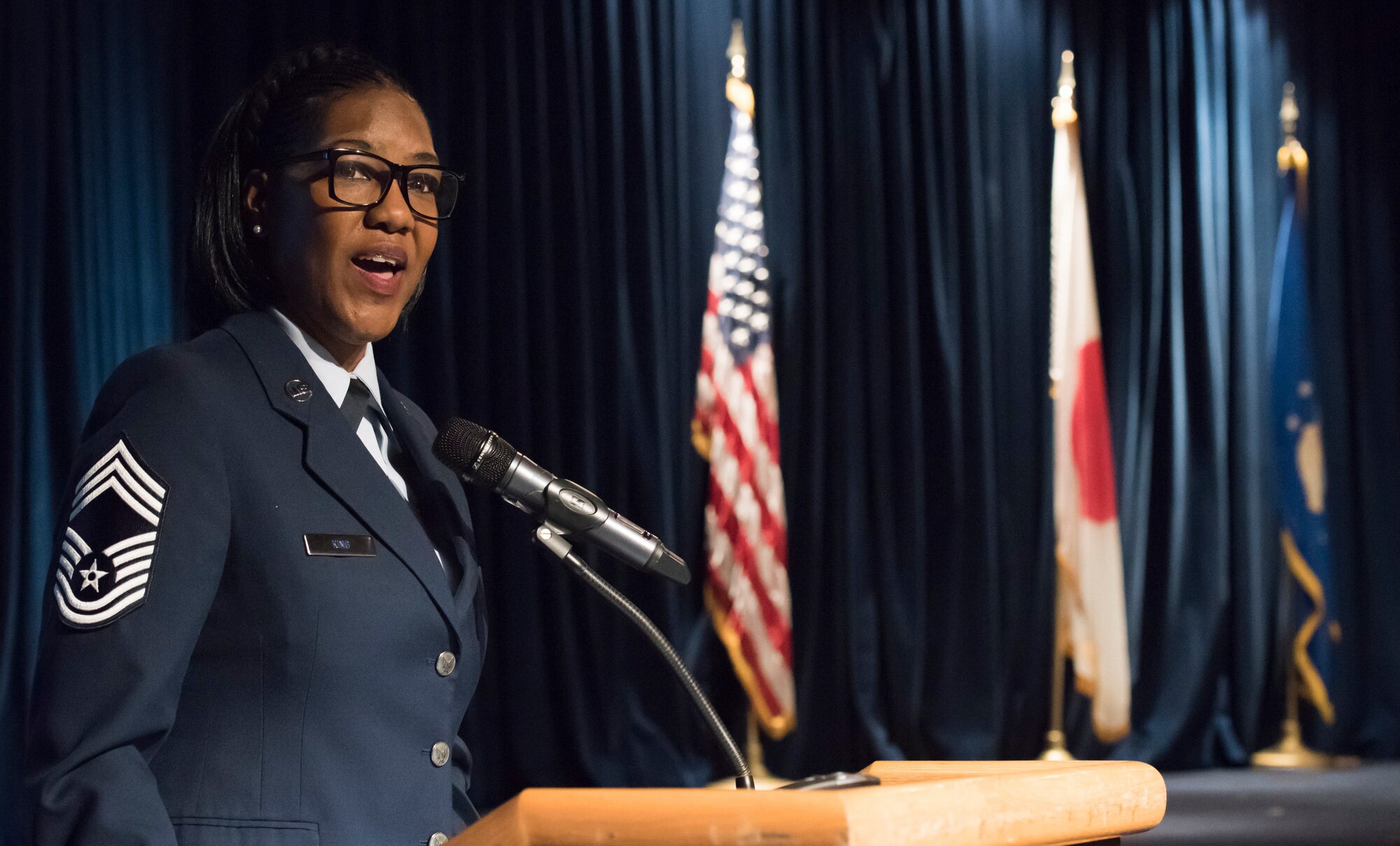 Chief Master Sgt. Tresse King, 374th Force Support Squadron superintendent, speaks during a Women’s History Month luncheon at Yokota Air Base, Japan, March 26, 2019.