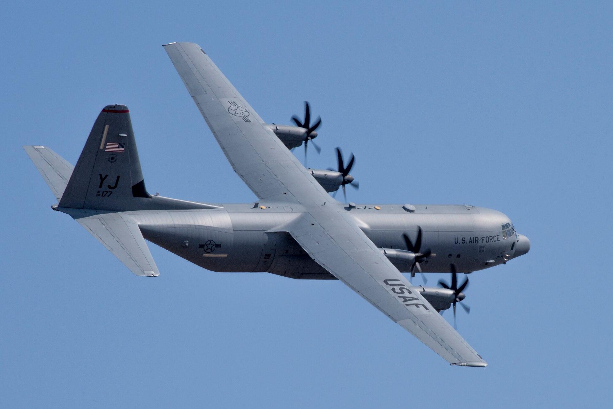 A 36th Airlift Squadron C-130J Super Hercules banks right during the Yokota C-130J Rodeo March 22, 2019, at Yokota Air Base, Japan. The goal of the competition was to have participants demonstrate their capabilities, improve procedures and enhance standardization for tactical operations. (U.S. Air Force photo by Senior Airman Donald Hudson)