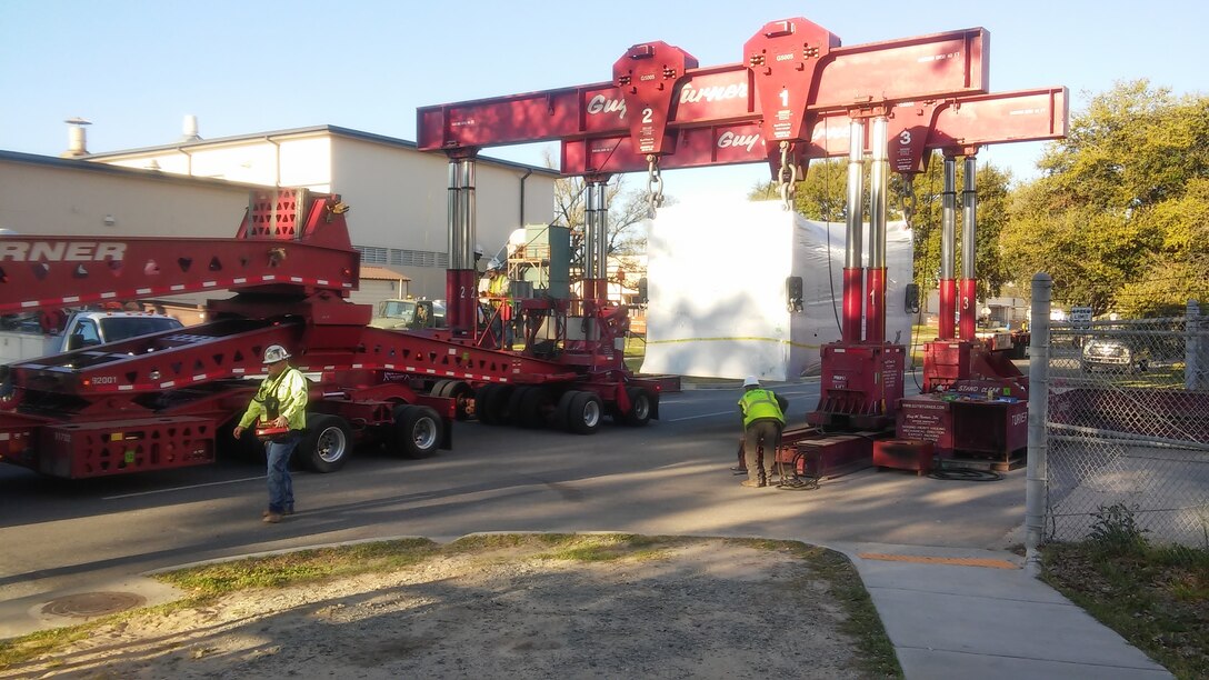 Robins Air Force Base recently received a new fluid cell press used to shape sheet metal into the angles and curves of the skin of aircraft March 22, 2019. The new press weighs in at a whopping 302,000 pounds and took a specialized 210-foot trailer that’s 18-feet, or two-lanes wide to deliver. (U.S. Air Force photo)