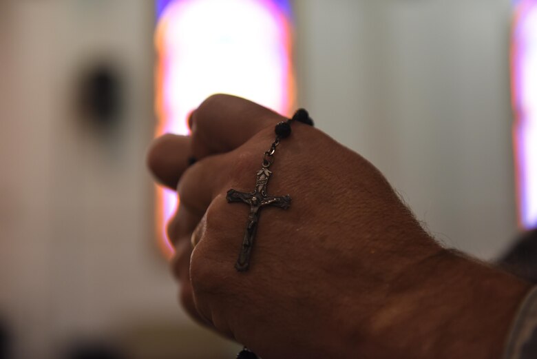 Chaplain (Maj.) Bradley Kimble, 14th Flying Training Wing deputy chaplain, holds a rosary in the BLAZE Chapel March 25, 2019, on Columbus Air Force Base, Mississippi. Although the chapel mainly offers Catholic and Protestant services, the chapel team will assist any Airmen with finding the right worship service that suits them. (U.S. Air Force photo by Senior Airman Beaux Hebert)