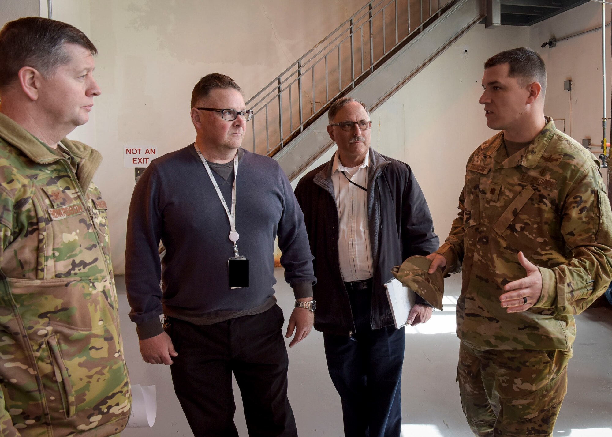 U.S. Air Force Maj. Alfred Traylor, 87th AMDS Bioenvironmental Engineering Flight commander, briefs U.S. Air Force Col. Neil R. Richardson, Joint Base McGuire-Dix-Lakehurst and 87th Air Base Wing commander, during a Water Production Plant tour, March 26, 2019 at Joint Base MDL, New Jersey. Traylor leads a 32-member team of professional engineers and technicians that apply engineering and scientific principles in anticipating, recognizing, and evaluating occupational and environmental health hazards for a base population of 45,000 people.