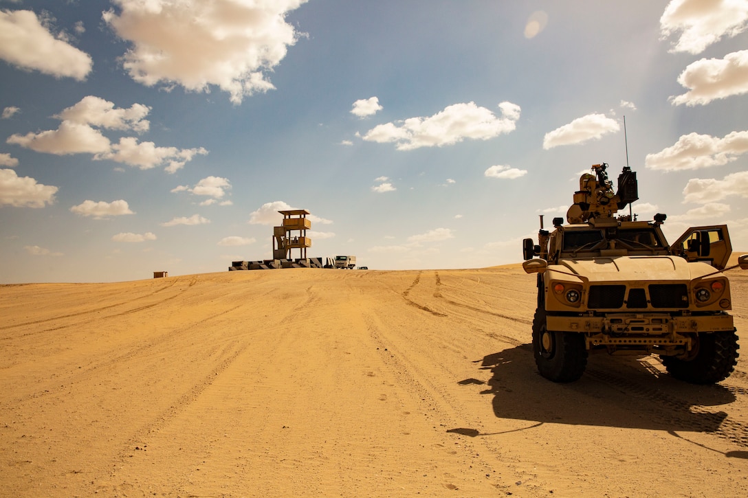 U.S. Marines with 2nd Low Altitude Air Defense Battalion Counter-Unmanned Aerial Systems Detachment, attached to Special Purpose Marine Air-Ground Task Force Crisis Response-Central Command, prepare to fire the Marine Air Defense Integrated System Mine Resistant Ambush Protected Vehicle during a live-fire range in southwest Asia Feb. 17, 2019. The MADIS is the first vehicle to utilize kinetic and non-kinetic measures to disable Counter-Unmanned Aerial Systems. SPMAGTF-CR-CC is specifically designed to be capable of deploying aviation, ground, and logistics forces forward at a moment’s notice.