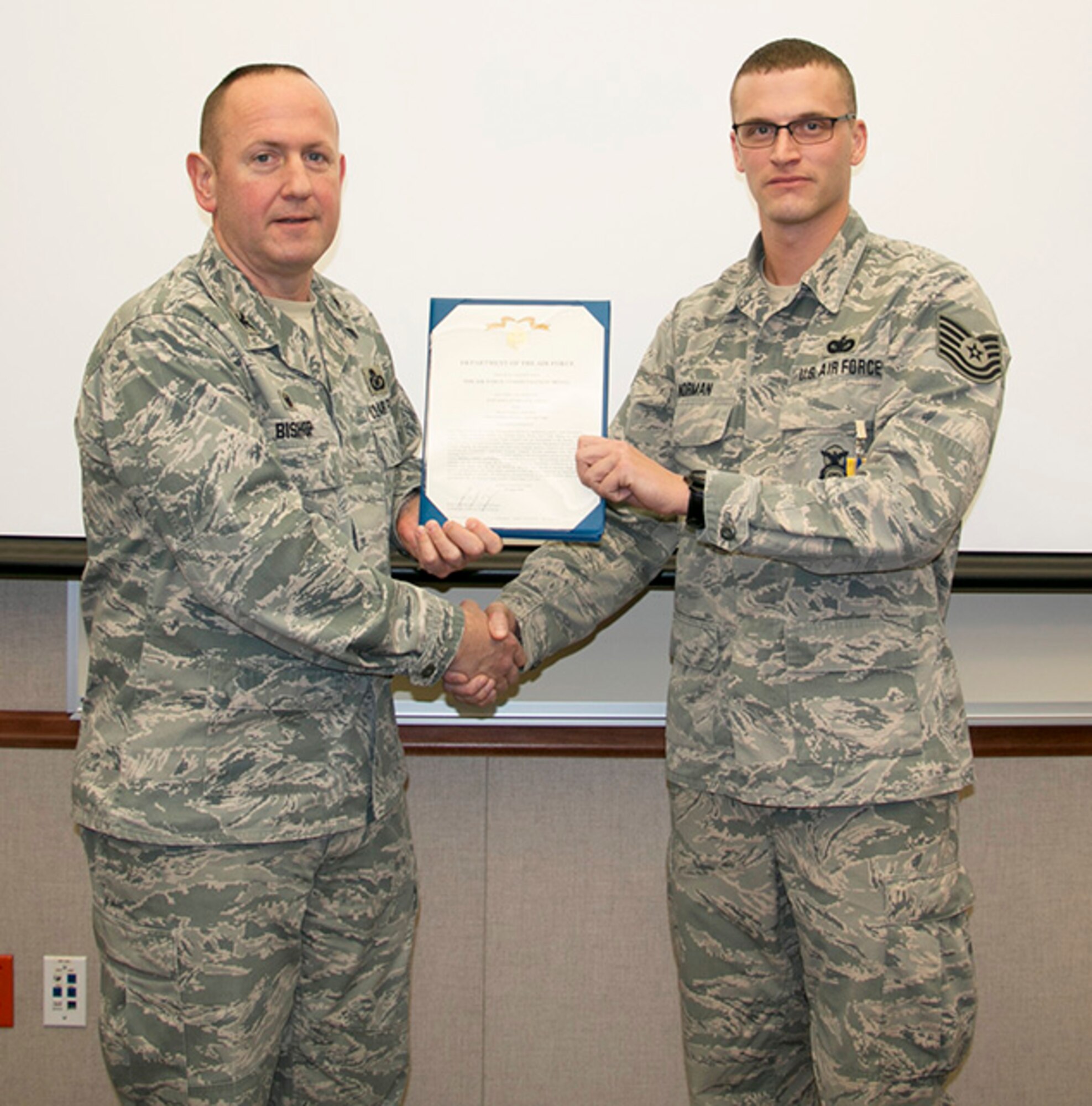 Norman Awarded AFCM