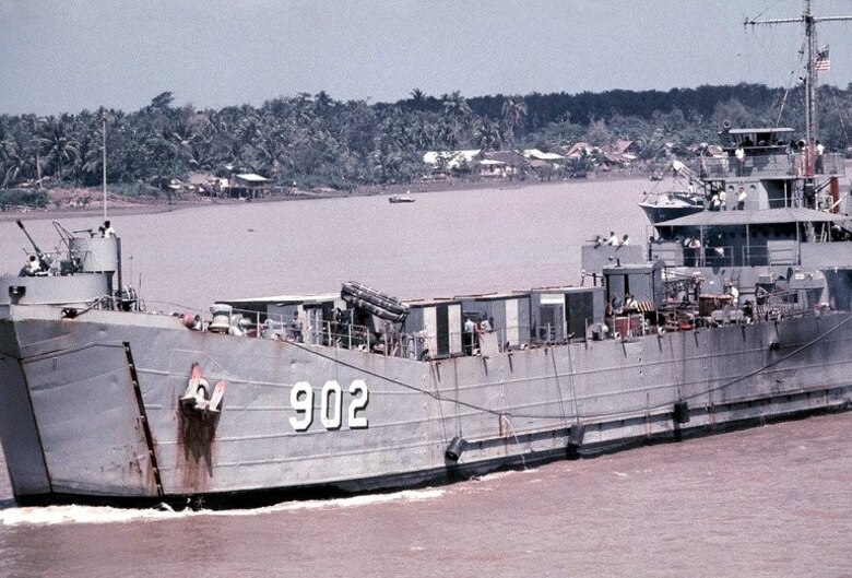 The USS Luzerne County (LST-902) in its heyday during the Vietnam War. The bell from the ship now resides aboard MCLB Barstow. (Official U.S. Navy photo)