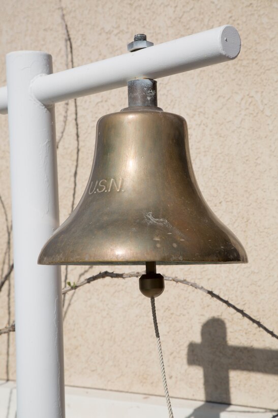 The 75-year-old bell from the USS Luzerne County (LST-902) sits outside the front entrance of Building 15 where it has been posted for the past 20 years.